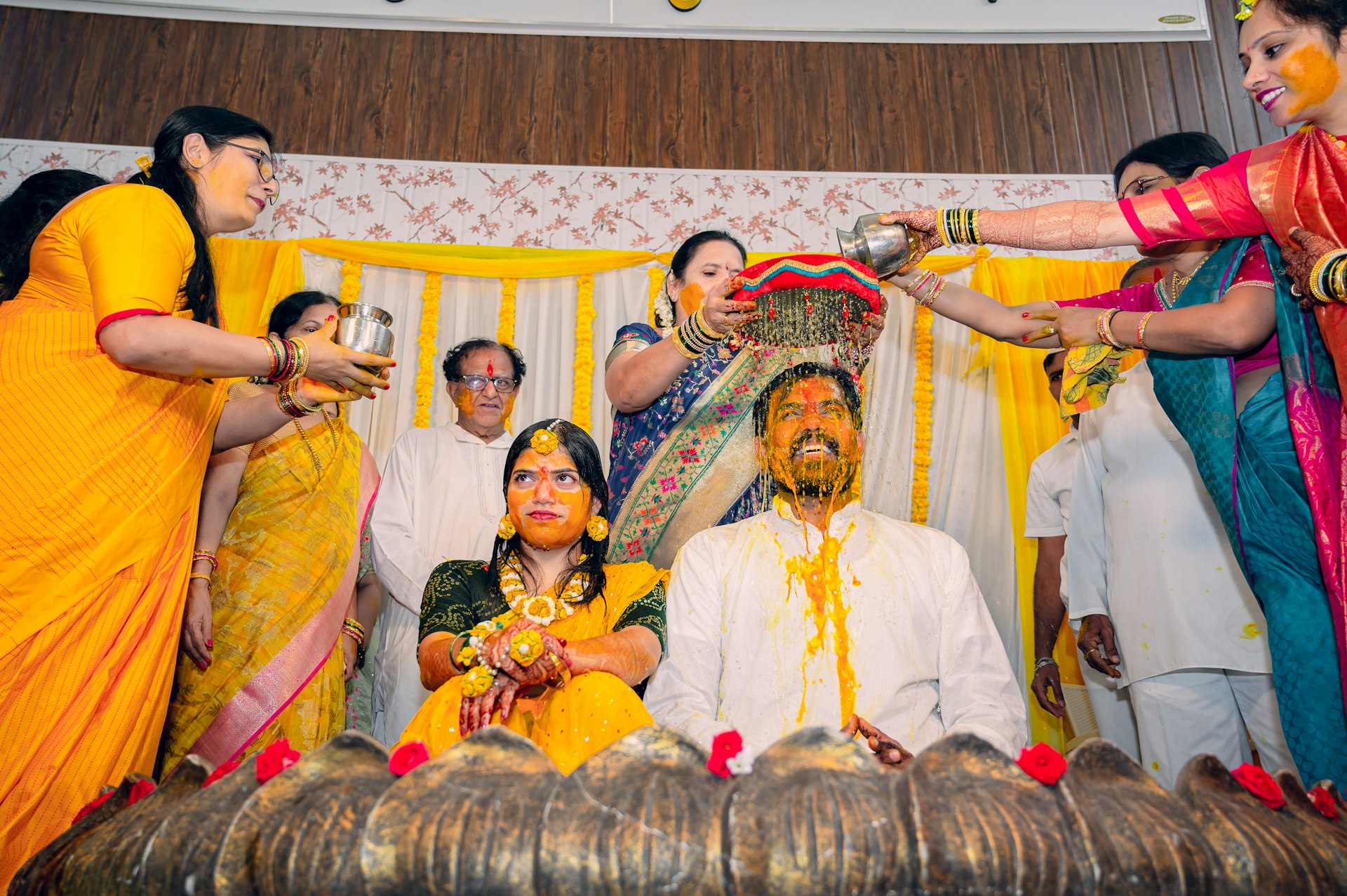 a group of people standing around each other